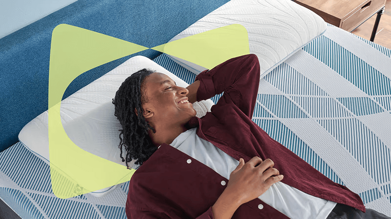 Man laying on Dreamlife mattress with Sealy Butterfly